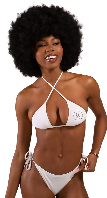 Smiling woman in a white bikini, showcasing her figure and the results of a cosmetic procedure.